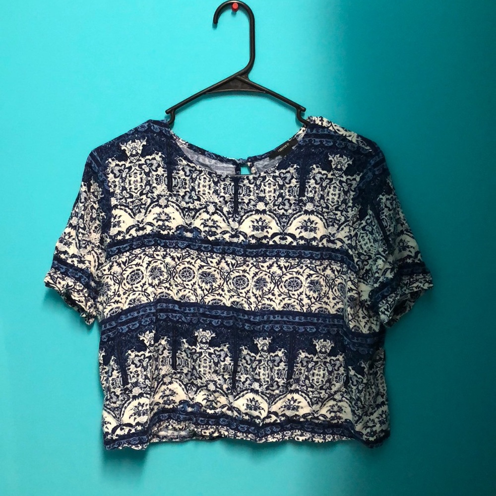 Embroidered top with buttoned down back